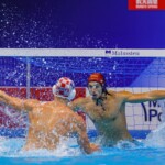FUKUOKA, JAPAN - JULY 23: Konstantin Kharkov of Croatia, Lazar Andric of Montenegro during the World Aquatics Championships 2023 Men's crossover match between Croatia and Montenegro on July 23, 2023 in Fukuoka, Japan (Photo by Albert ten Hove/Orange Pictures)