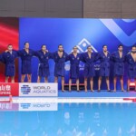 FUKUOKA, JAPAN - JULY 27: Lazar Andric of Montenegro, Aljosa Macic of Montenegro, Miroslav Perkovic of Montenegro, Kanstantsin Averka of Montenegro, Jovan Vujovic of Montenegro, Vlado Popadic of Montenegro, Stefan Vidovic of Montenegro, Djuro Radovic of Montenegro, Aleksa Ukropina of Montenegro, Vladan Spaic of Montenegro, Dusan Matkovic of Montenegro, Vasilije Radovic of Montenegro, Petar Tesanovic of Montenegro during the national anthem during the World Aquatics Championships 2023 Men's Waterpolo Classification 5th-8th place match between Montenegro and Italy on July 27, 2023 in Fukuoka, Japan (Photo by Albert ten Hove/Orange Pictures)
